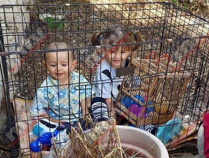 ام سورية تضع طفليها في قفص لتوفير لقمة العيش