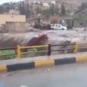 سيول تجرف السيارات في الأردن